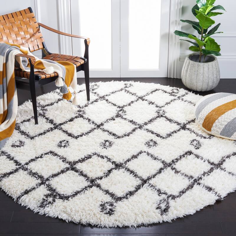 SAFAVIEH Handmade Flokati Theresie Shag Solid Polyester Rug - 6'7" Round - Ivory/Dark Grey