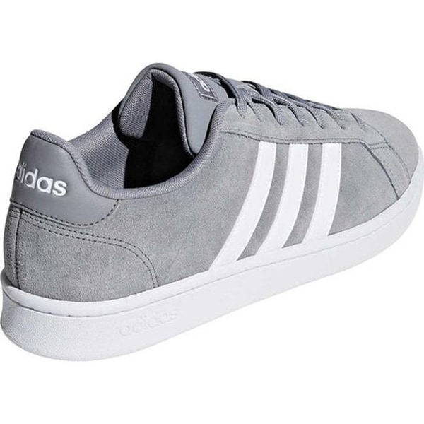 grey and white adidas shoes