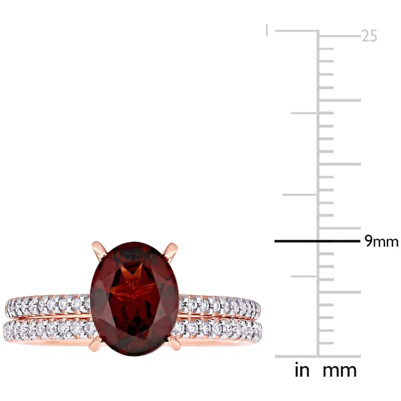 Miadora 14k Rose Gold Oval-cut Garnet and 1/4ct TDW Diamond Solitaire Bridal Ring Set