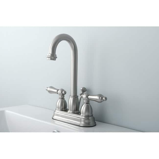 Kingston Brass Restoration Centerset Bathroom Faucet with Pop-Up Drain