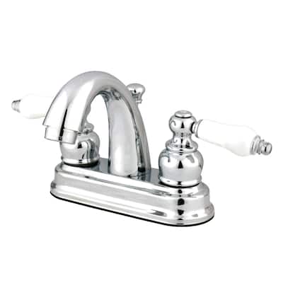 Kingston Brass Restoration Centerset Bathroom Faucet with Pop-Up Drain