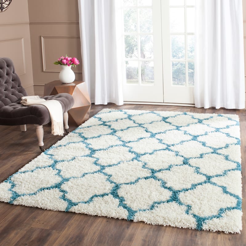 SAFAVIEH Kids Shag Judyth Nursery Playroom 2-inch Thick Rug - 5' x 8' - Ivory/Blue