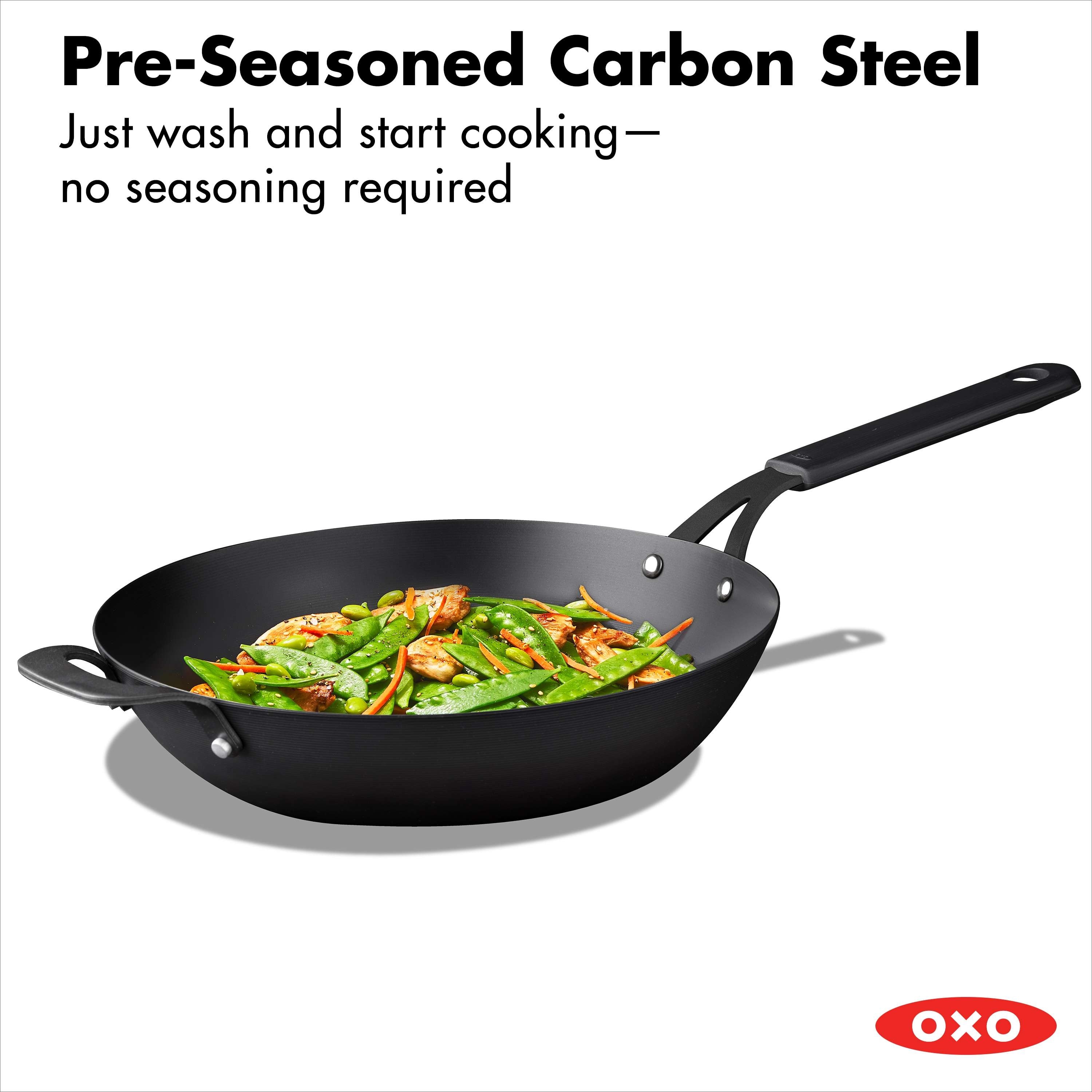 https://ak1.ostkcdn.com/images/products/is/images/direct/0efbf633ae30dd3fecc1743be6554b58c0b0ce1f/OXO-Black-Steel-12%22-Wok-with-Helper-Handle-%26-Silicone-Sleeve.jpg