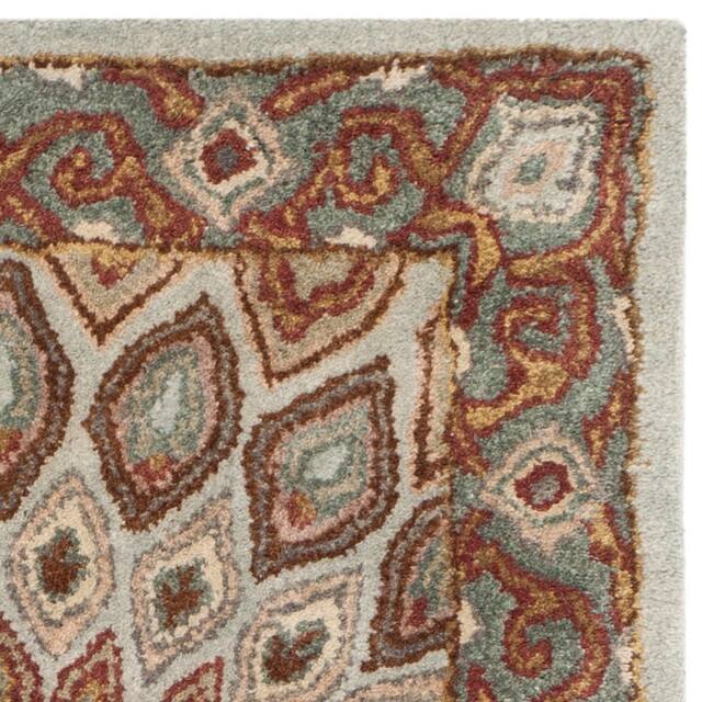 SAFAVIEH Handmade Heritage Cassondra Traditional Oriental Wool Rug