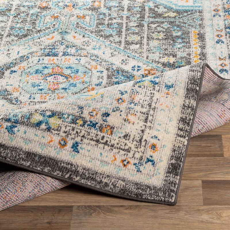 The Curated Nomad Shratton Distressed Persian Medallion Area Rug