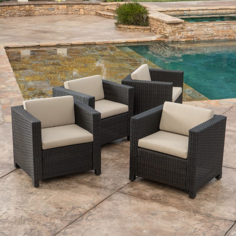 Roomfitters 4-Piece Wicker Patio Conversation Set with Cushions and Coffee Table