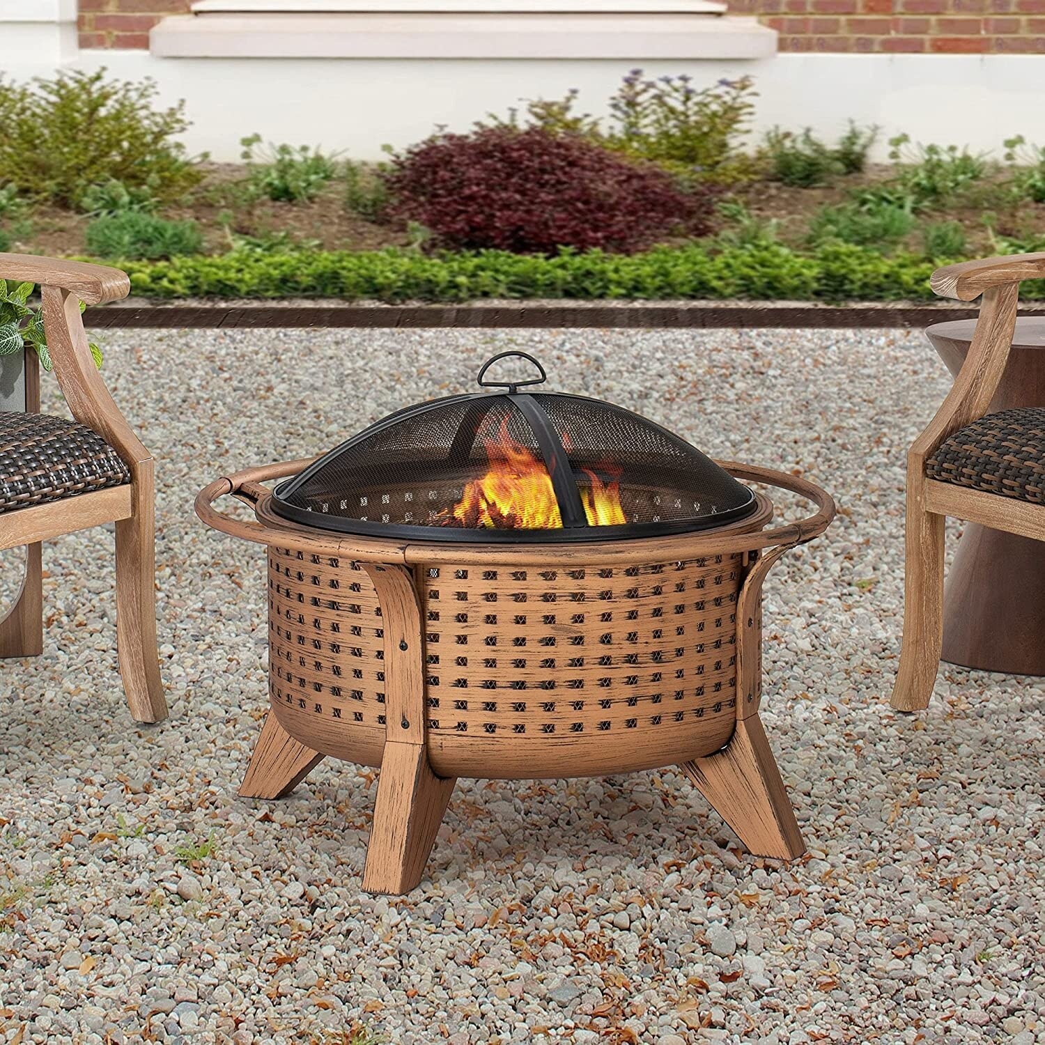 https://ak1.ostkcdn.com/images/products/is/images/direct/0f65d86d0cdf4638c6d19e4a6b6ab992d51e5f48/Sunjoy-30-in.-Outdoor-Wood-Burning-Fire-Pit%2C-Patio-Woven-Round-Steel-Firepit-Outside-with-Spark-Screen-and-Poker.jpg