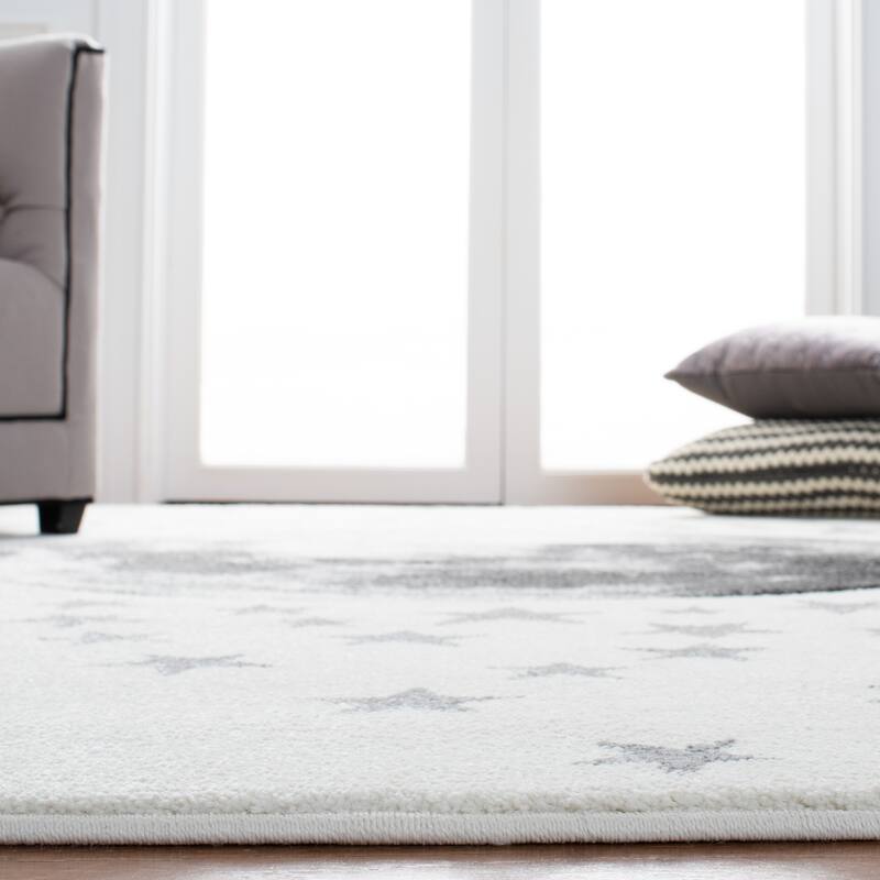 SAFAVIEH Carousel Kids Atsumi Moon Rug