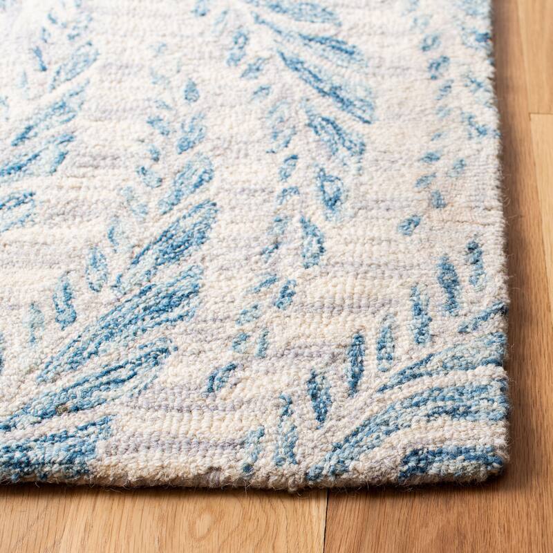 SAFAVIEH Handmade Micro-Loop Maele Modern Wool Rug