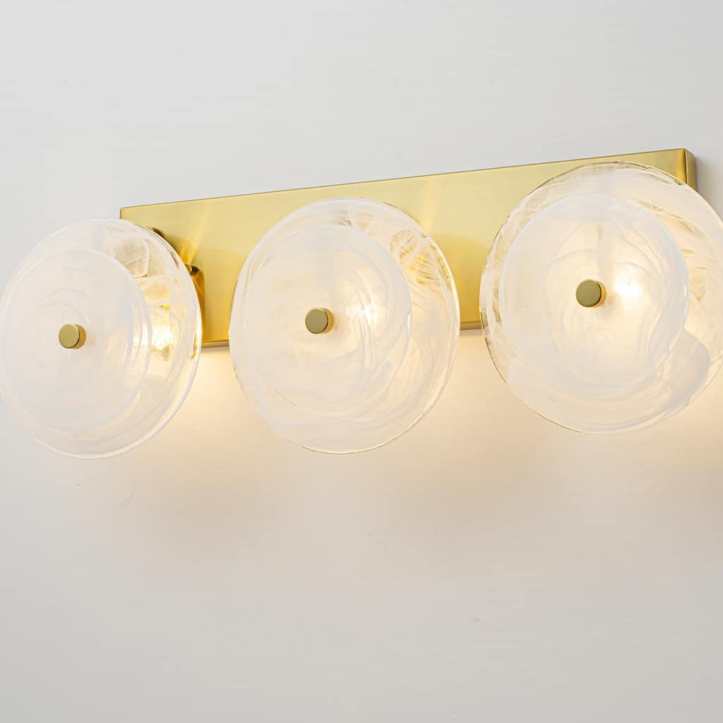 3-Light Mid-Century Modern Brushed Brass Vanity Light with Cloud-Textured Round Glass glass disc