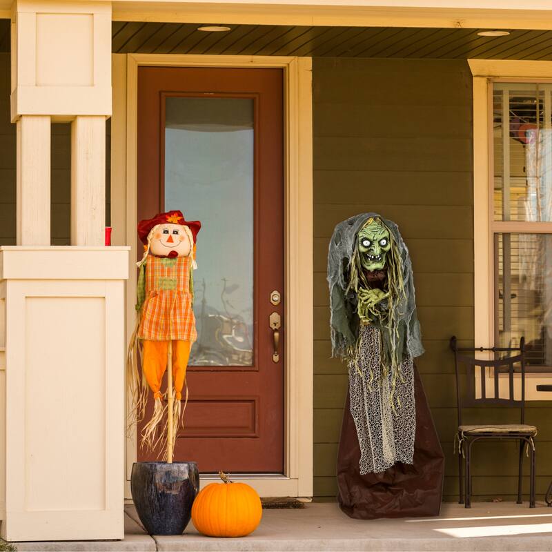 National Tree Company Pre Lit Animated Scary Green Witch, Green, Sound Activated, LED Lights, Battery Operated, 59 Inches