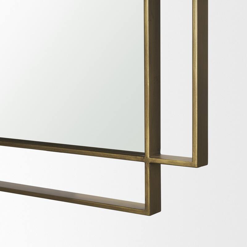 Tiva is a rectangular mirror with a brushed gold finished dual metal frame. - 31.5L x 1.8W x 43.3H