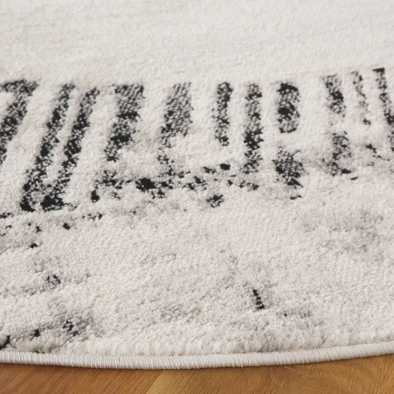 SAFAVIEH Skyler Otelia Modern Abstract Border Rug