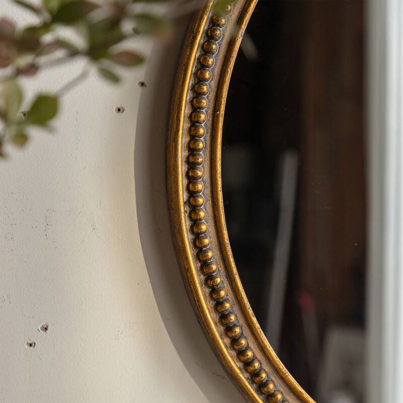 Elegant Oval Wall-mounted Decorative Mirror With Intricate Gilded Border