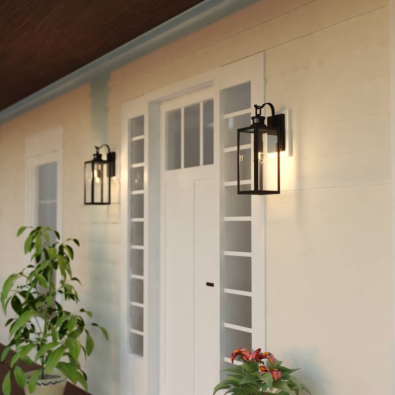 VAXCEL Clinton Matte Black Motion Sensor Dusk to Dawn Outdoor Wall Sconce Light Fixture, Steel, Clear Glass Shade