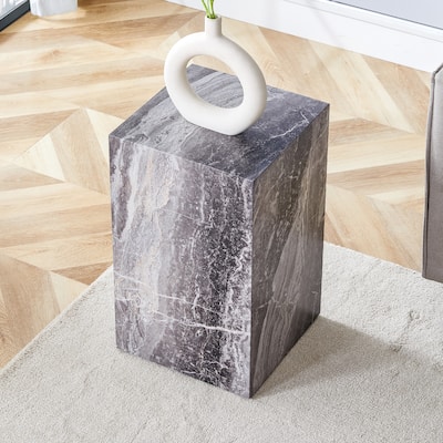 Elevate your living space with this modern MDF coffee table, which showcases gray textured patterns