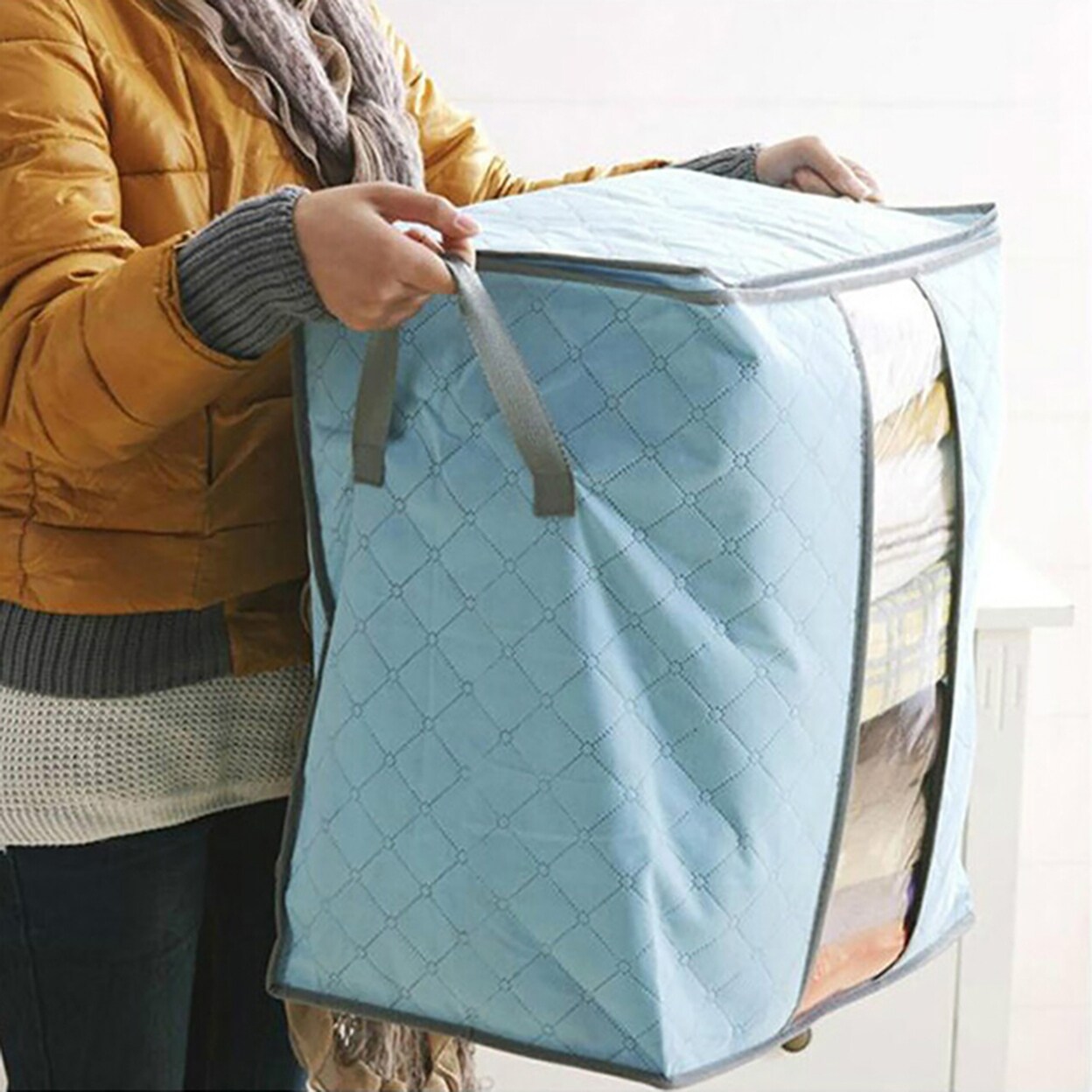 https://ak1.ostkcdn.com/images/products/is/images/direct/103d6107f97d0e1ff4ca3bf2b26b187e9206f3f4/Dirt-Proof-Quilt-Storage-Bag-With-Zipper-Non-Woven-Fabric-Tear-Resistant-Blanket-Storage-Bag-For-Sweaters.jpg