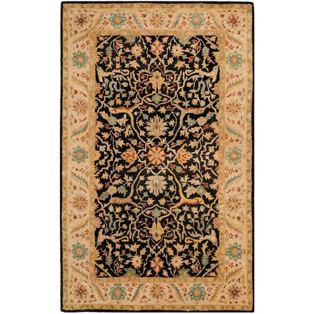 SAFAVIEH Handmade Antiquity Izora Traditional Oriental Wool Rug - 4' x 6' - Black