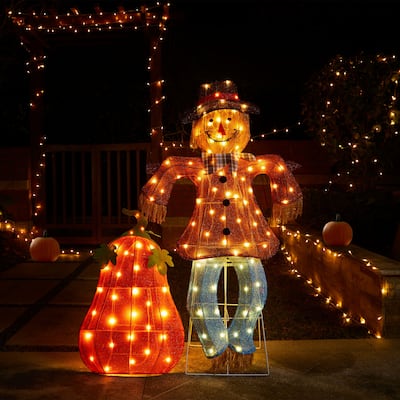 Glitzhome 4ft Set of 2 Lighted Fall Scarecrow & Pumpkin Outdoor Decor