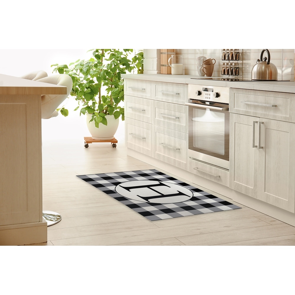 https://ak1.ostkcdn.com/images/products/is/images/direct/108da2347ec24d3a8fd2f28752c9aa0fe9c76a5f/MONO-BLACK-%26-WHITE-H-Kitchen-Mat-By-Kavka-Designs.jpg