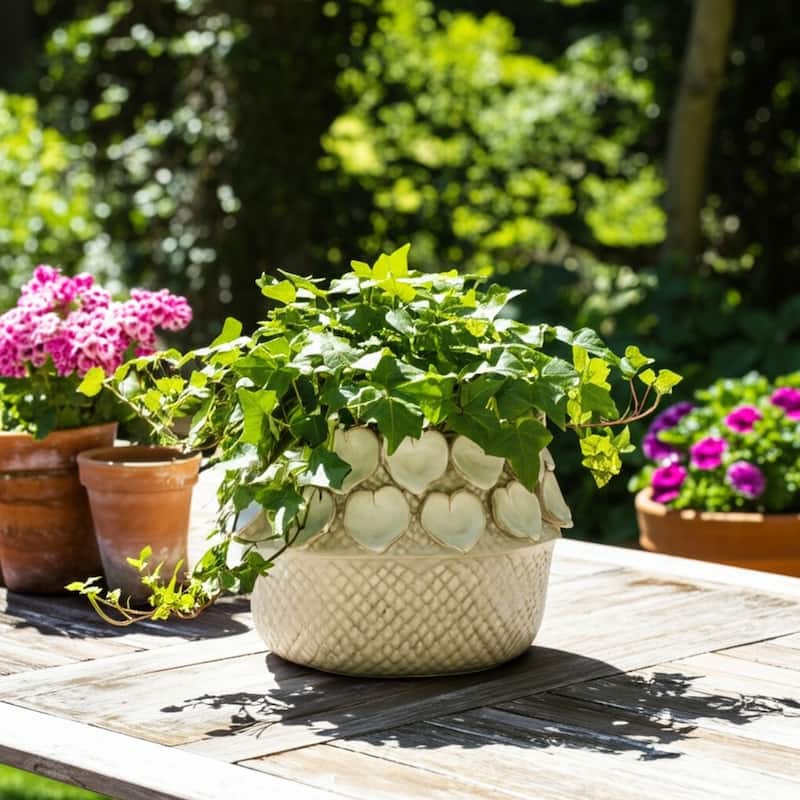 Stylish Ceramic Planter with Sculptural Leaf Heart Details