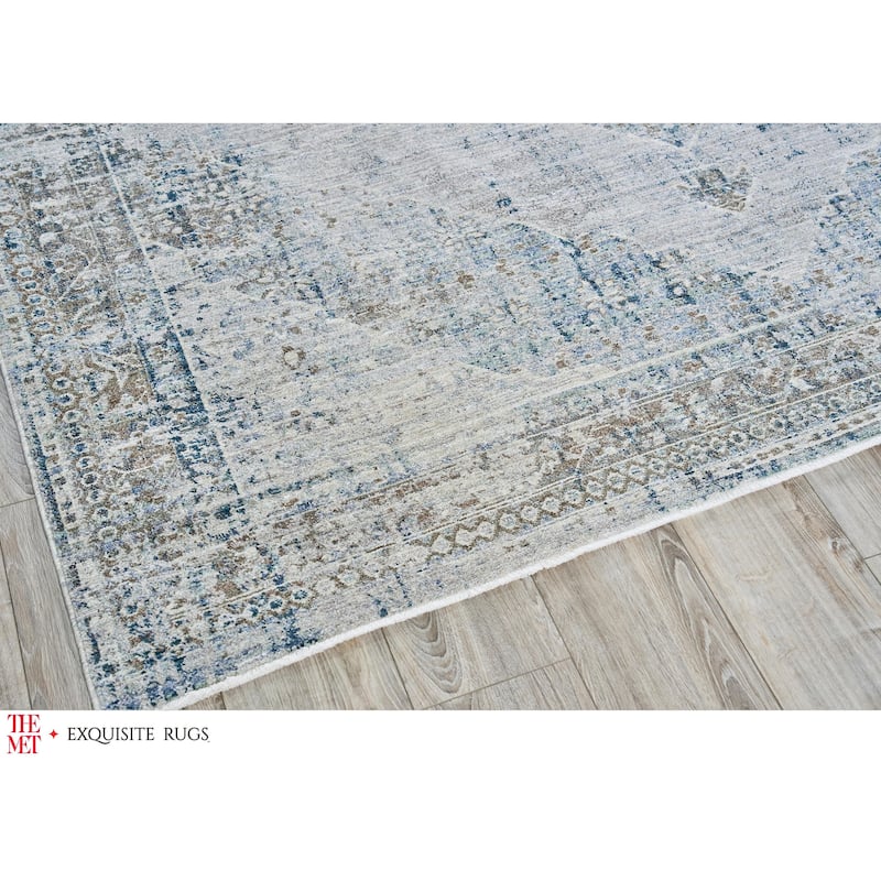 The Met X Exquisite Rugs Vintage Looms Beige/Blue Area Rug.