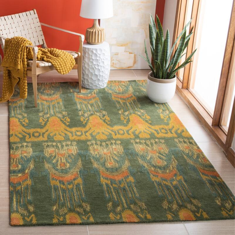 SAFAVIEH Handmade Ikat Audna Modern Wool Rug - 9' x 12' - Olive/Gold