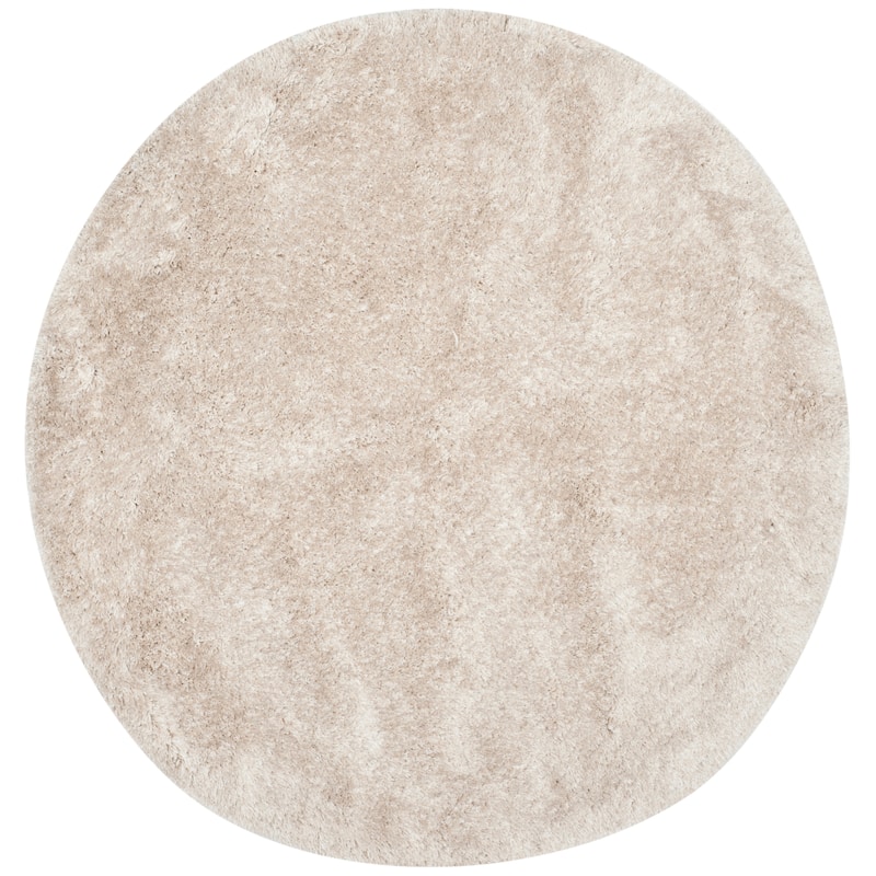 SAFAVIEH Handmade South Beach Leonella Shag Solid Polyester Rug