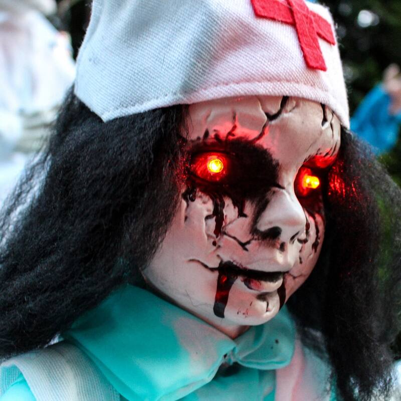 Haunted Hill Farm 1.8-ft. Animatronic Nurse, Indoor/Outdoor Halloween Decoration, Red LED Eyes, Poseable, Carrie