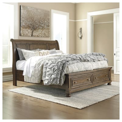 Flynnter Medium Brown Sleigh Storage Bed.