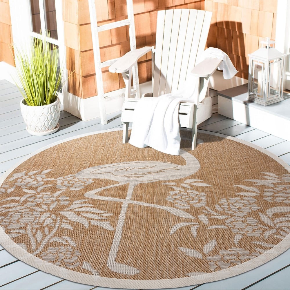 Isola Tropical Indoor/Outdoor Area Rug by Porch & Den