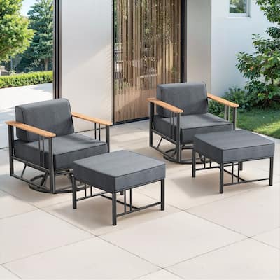 Puffin 4-Piece Black Metal Frame Outdoor Swivel Gliding Chairs with 6-Inch Dark Gray Cushions and Ottomans