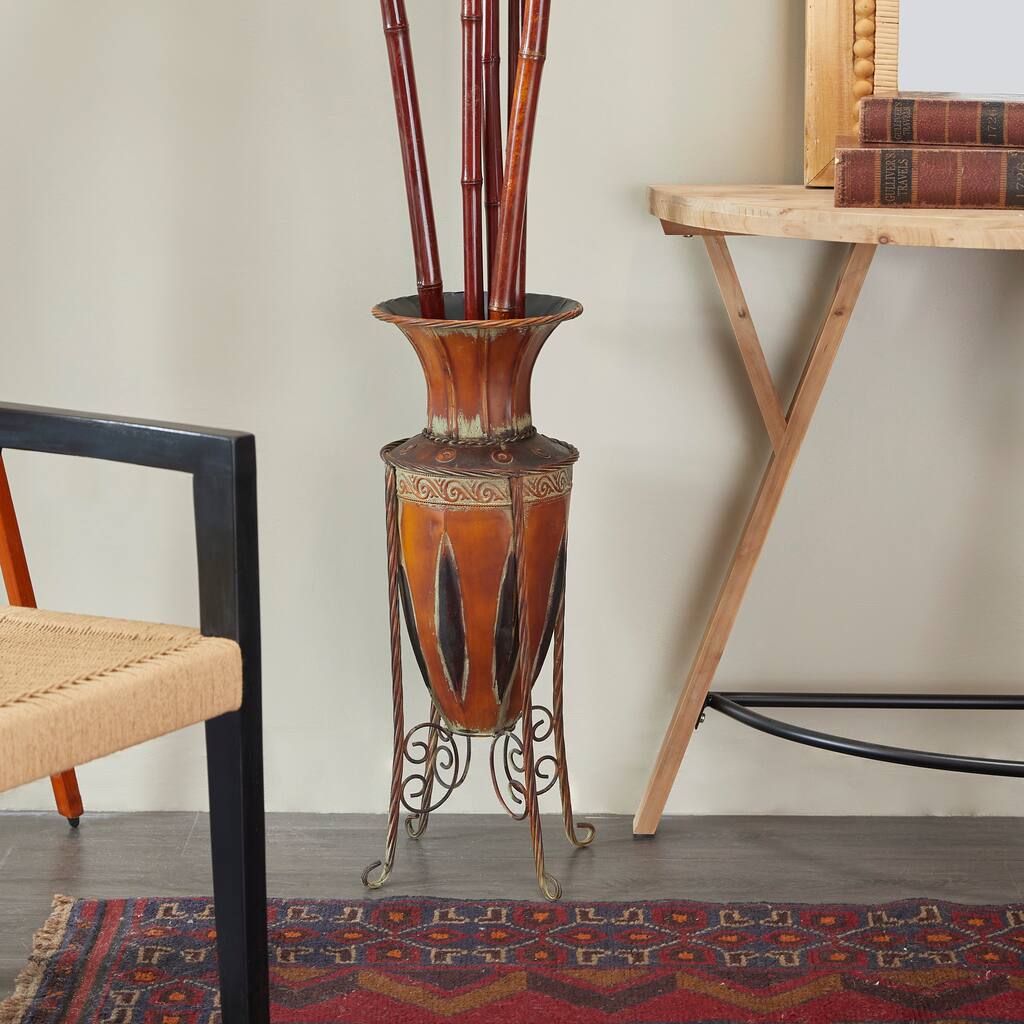Brown Metal Tall Decorative Vase with Attached Metal Stand and Intricate Design