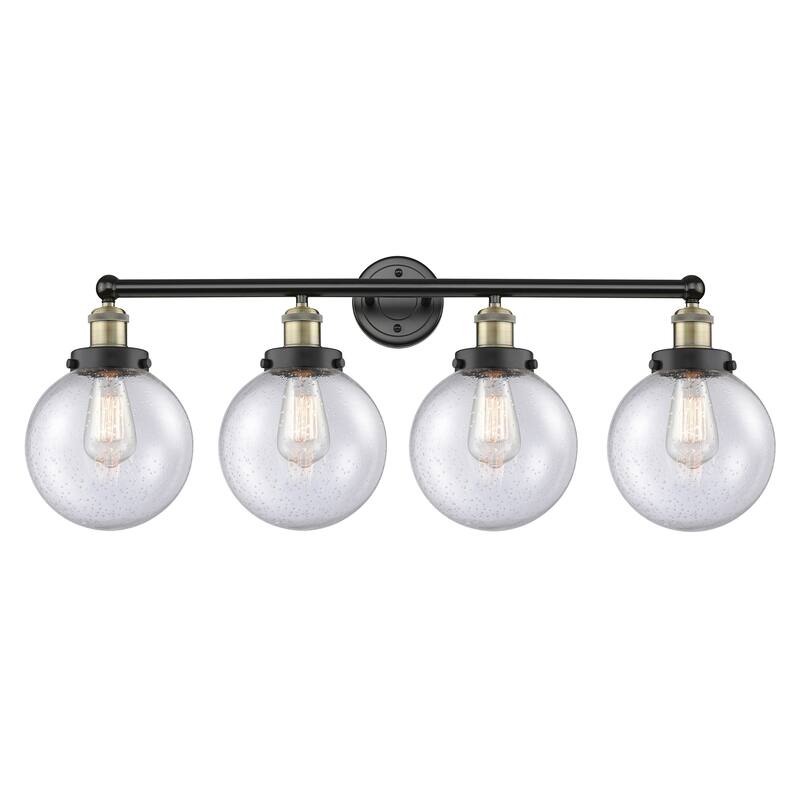 Innovations Lighting Large Beacon - 4 Light 34" Bath Vanity Light - Black Antique Brass/Seedy