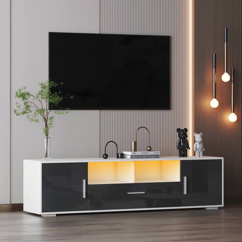 Contemporary TV Console with Remote-Controlled LED Lighting, Holds 65-Inch TVs, Ample Storage & Sturdy Build.