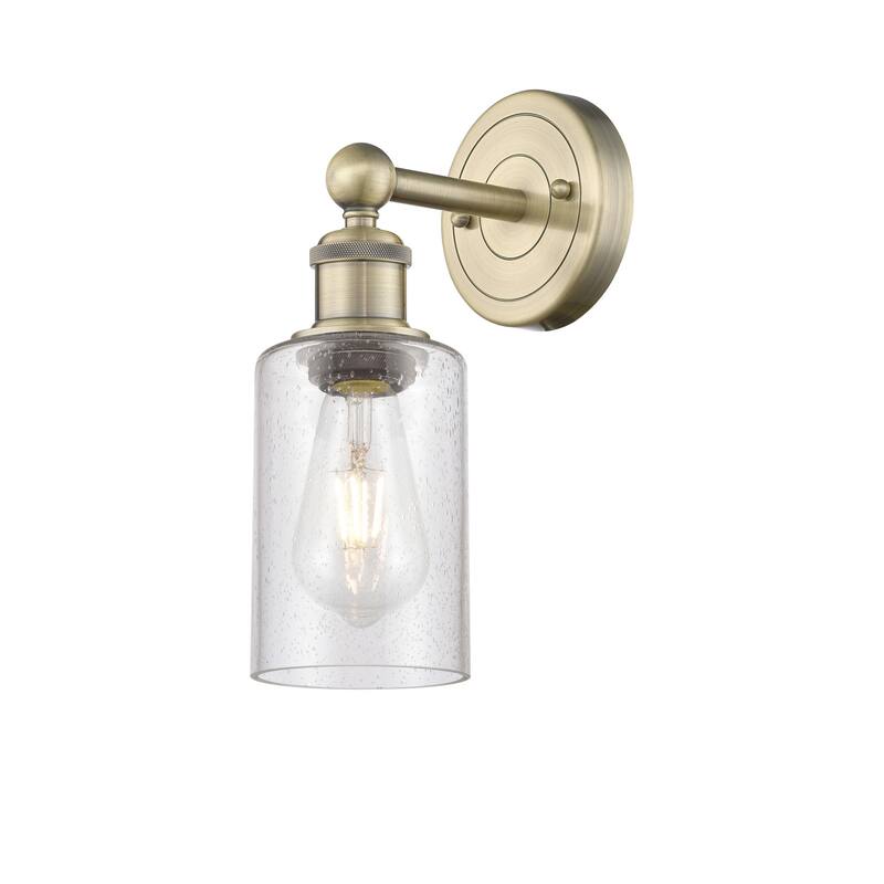 Innovations Lighting 616-1W-11-4 Clymer Sconce Clymer 11" Tall Wall - Antique Brass / Seedy