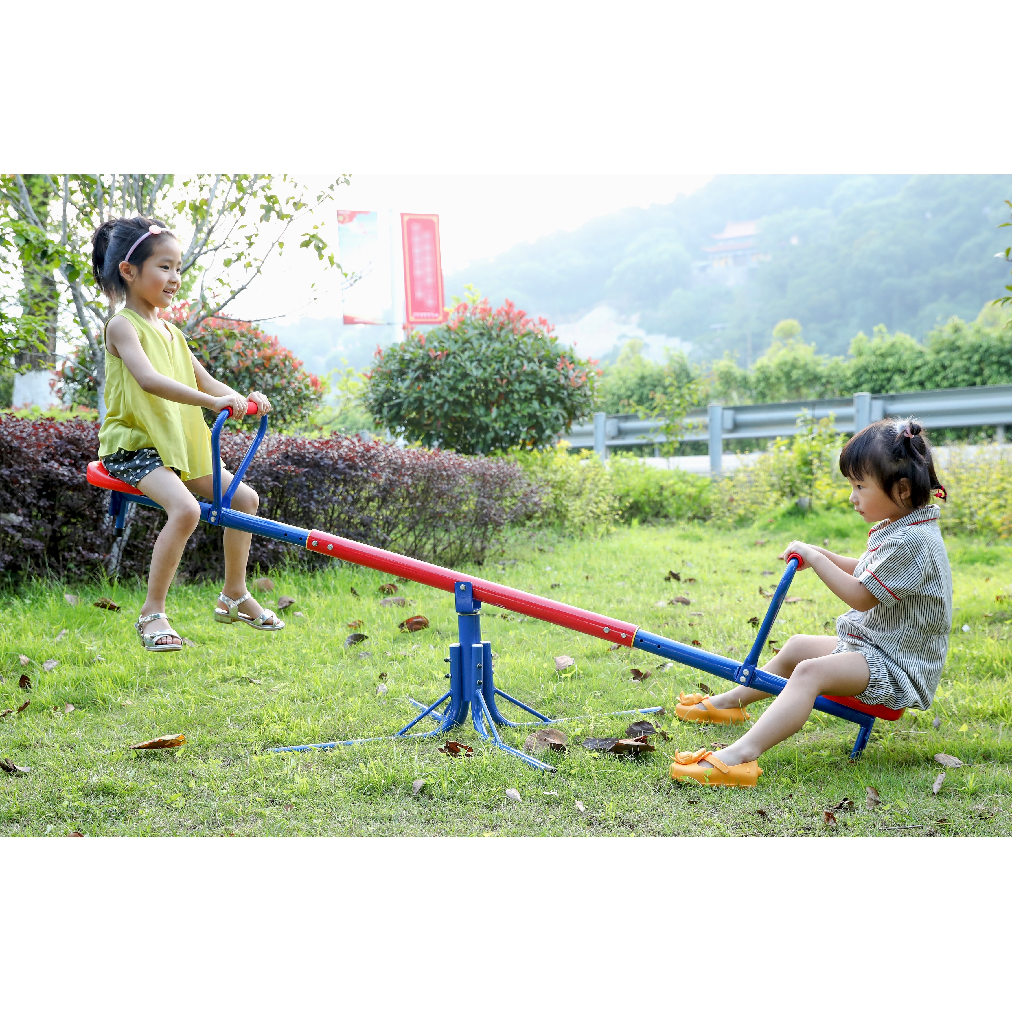 Extendable Outdoor Red and Blue Metal Rotating Seesaw - Overstock