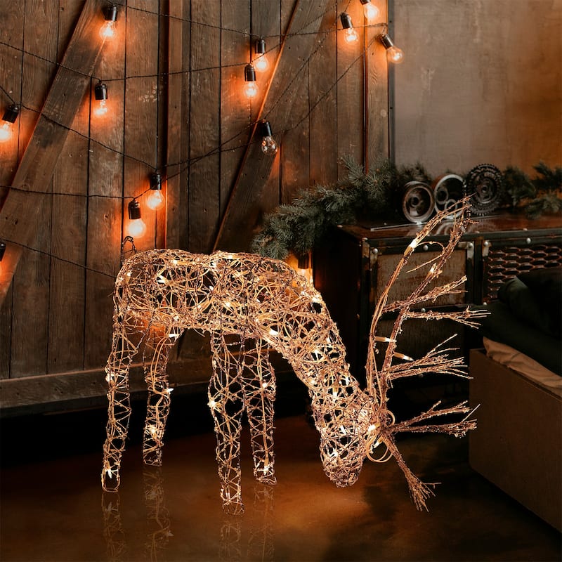 Alpine Corporation Outdoor Rattan Grazing Christmas Reindeer Lawn Decoration with White Halogen Lights