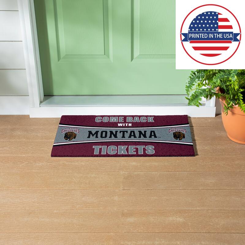 University of Montana 28 in. x 16 in. PVC "Come Back With Tickets" Trapper Door Mat