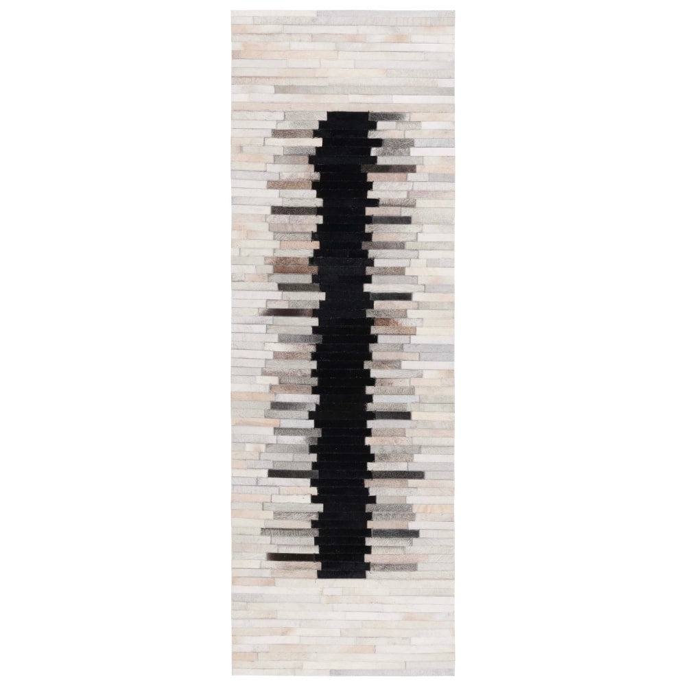 SAFAVIEH Handmade Studio Leather Lakeshia Mid-Century Modern Rug