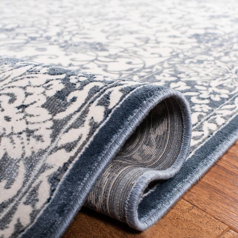 SAFAVIEH Noble Tjanka Modern Oriental Polyester Rug