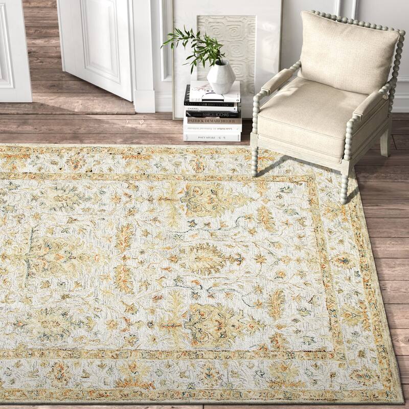 Sevita Floral Bordered Area Rug