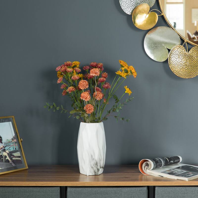 Contemporary ceramic table vase featuring a marble look design and geometric shape, ideal as a flower holder
