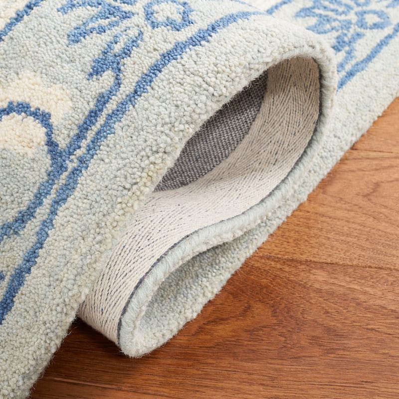 SAFAVIEH Handmade Antiquity Lauresha Wool Rug