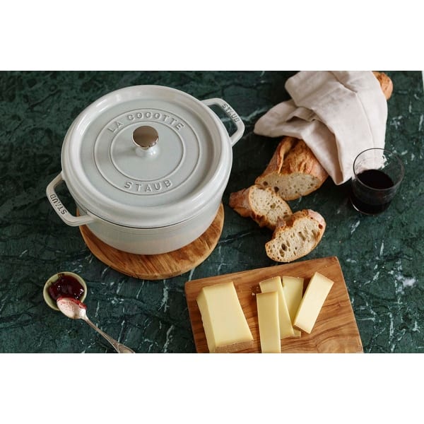 https://ak1.ostkcdn.com/images/products/is/images/direct/12d79e2464cf7f822b6477dddba7cf4d0eb75e4c/Staub-Cast-Iron-2.75-qt-Round-Cocotte.jpg?impolicy=medium