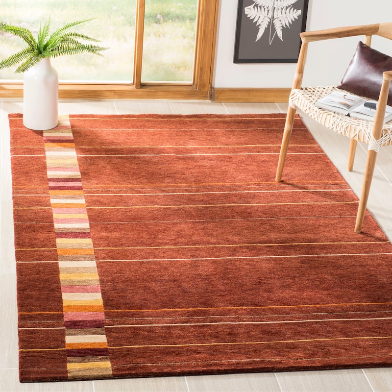 SAFAVIEH Couture Hand-knotted Tibetan Fayge Modern Wool Rug - 6' x 9' - Maroon/Multi