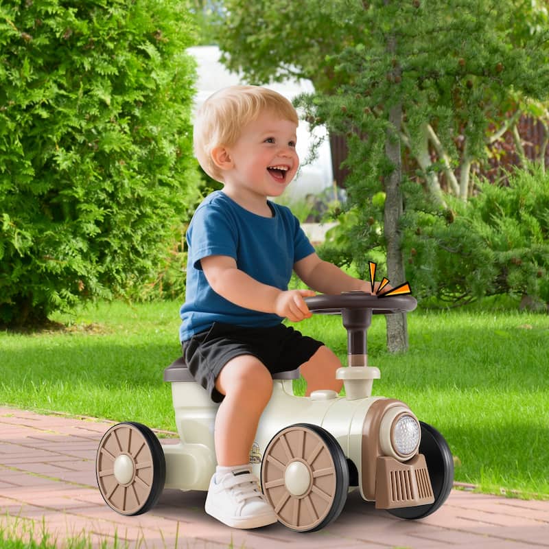 Kids Ride On Sliding Car with Steering Wheel Sound and Under Seat Storage Foot to Floor Push Toy Vehicle for Toddlers