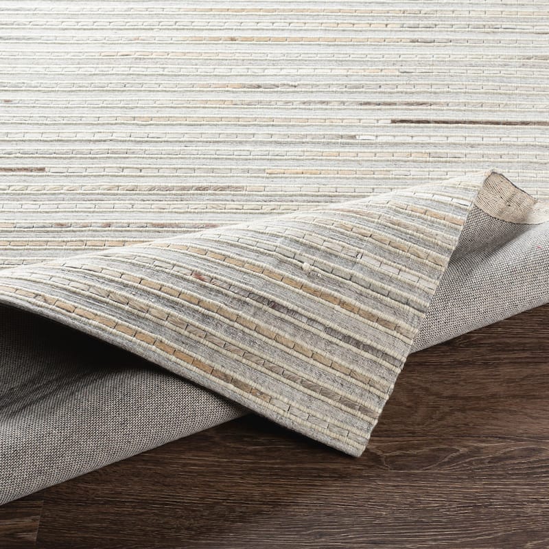 Coreen Handmade Modern Striped Hair on Hide Area Rug
