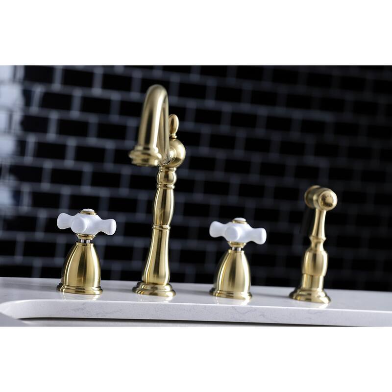 Kingston Brass Heritage Deck Mount Widespread Kitchen Faucet with Brass Sprayer