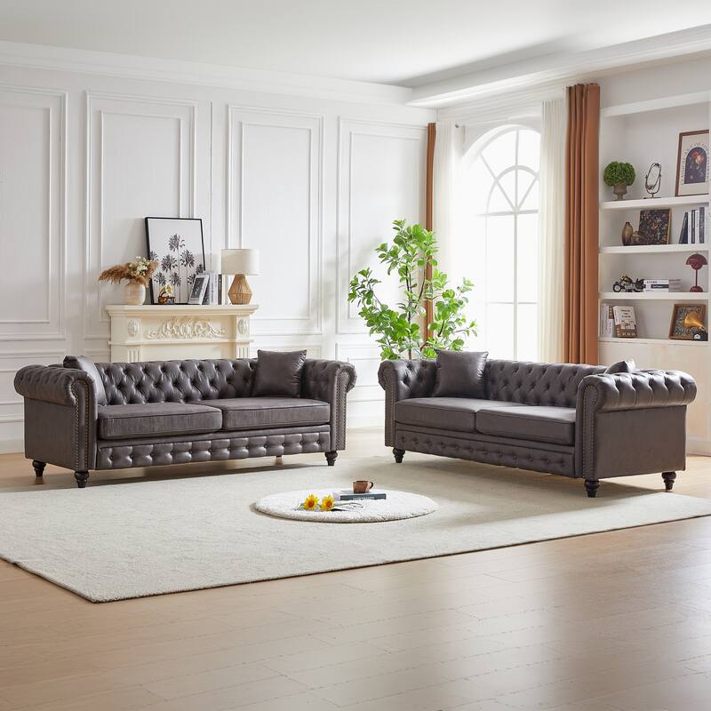 Classic Chesterfield Sofa with High-Density Cushions and Metal Accents